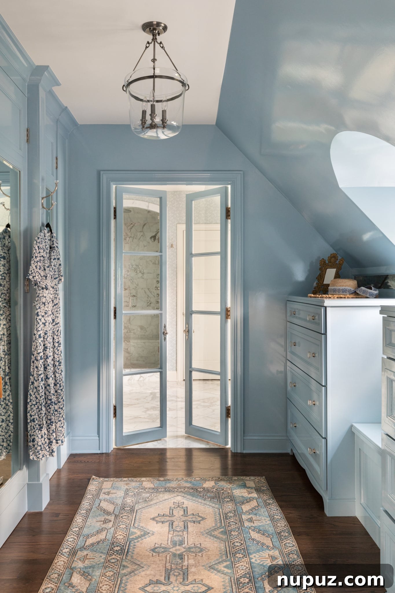 Alexandra Kaehler's design seamlessly integrates various patterns and luxurious materials to create a cohesive, visually rich, and deeply engaging interior environment that captivates the eye.