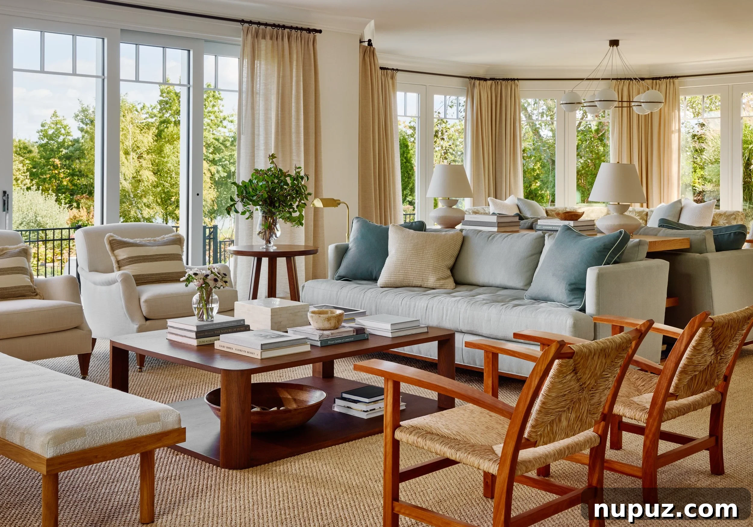 Charming blue and white living room, rich in texture and layers, by Atelier Roan Design.