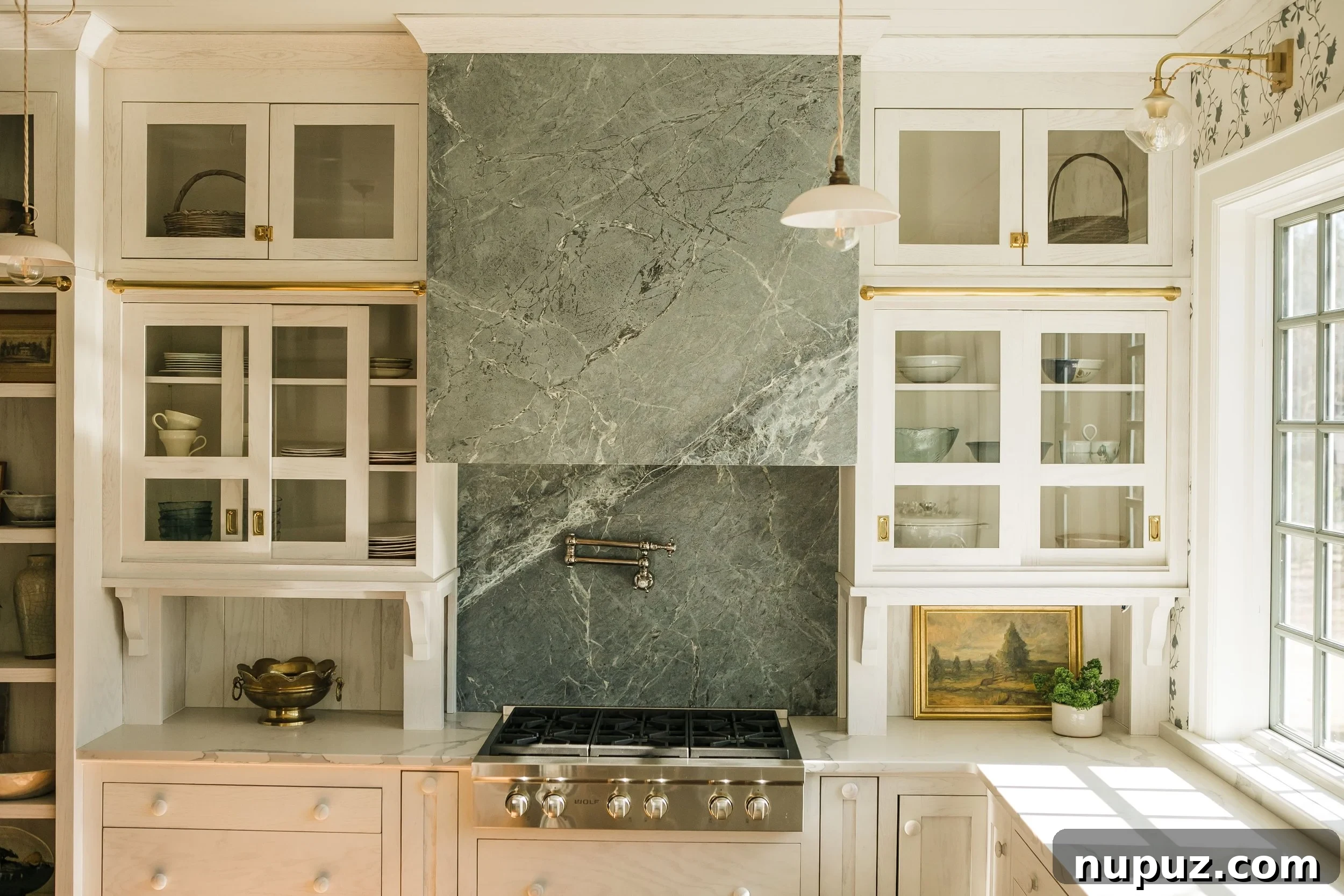Infuse Your Kitchen with Personality Smart Design Solutions 4 Close-up of elegant brass library lights illuminating open shelves in a Misfit House kitchen by Monica Stewart, showcasing curated decor. Kristin Karch Photography.
