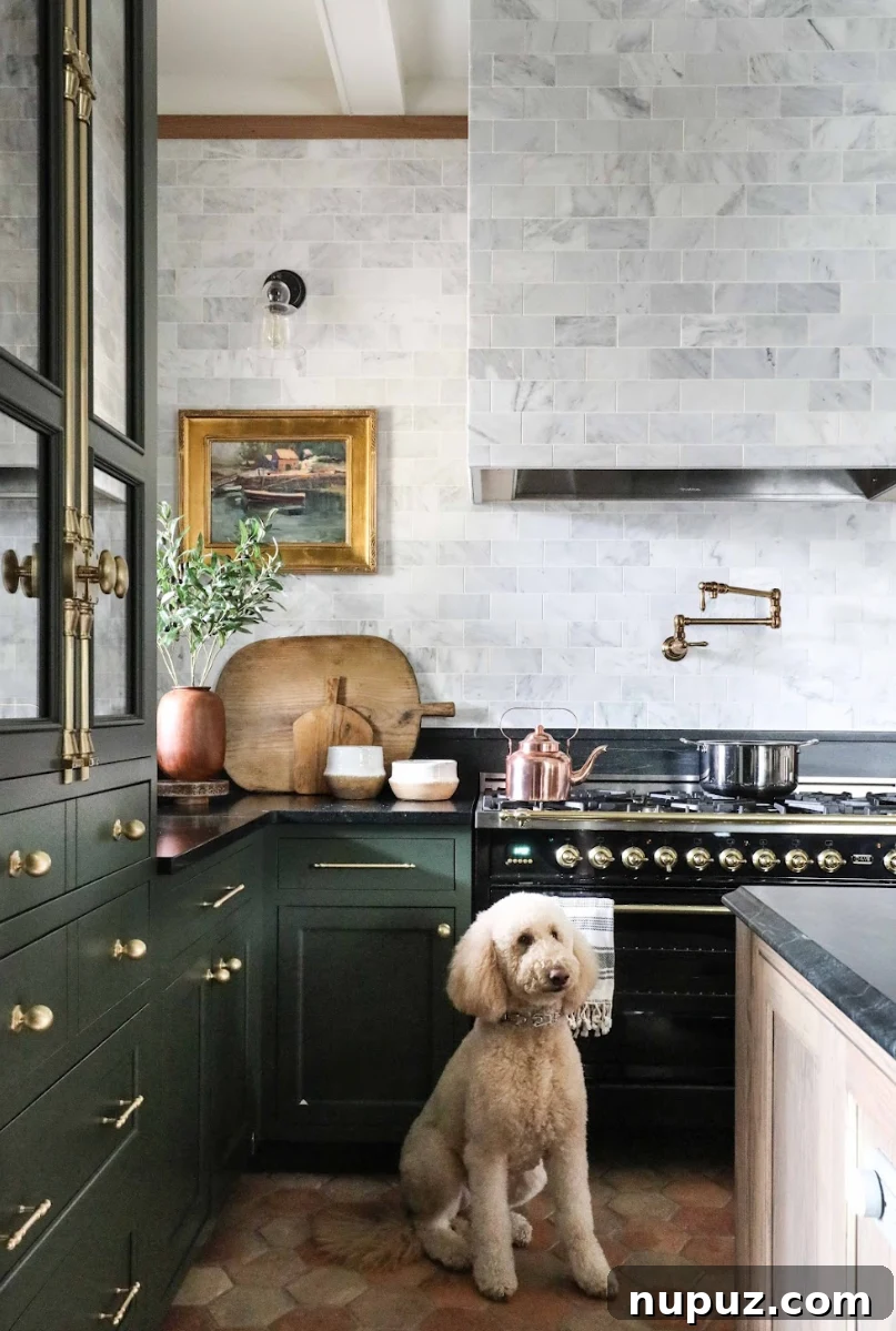Cozy kitchen nook featuring warm wooden paneling, a built-in bench with cushions, and a small round table, designed for intimate gatherings by Park and Oak Design.
