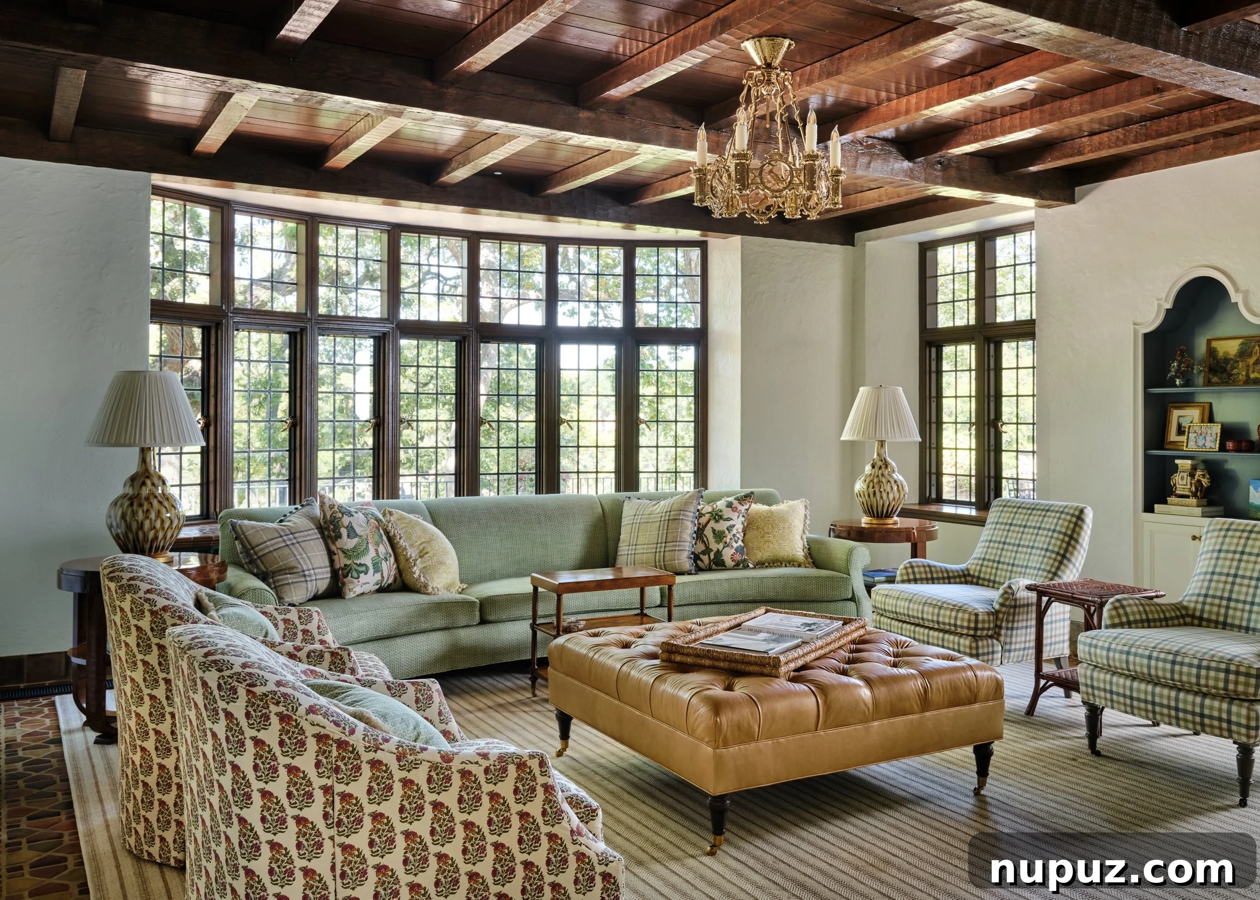 Warm living room featuring a stained wood beam ceiling, exemplifying Jenkins Interiors' cozy and elegant style.