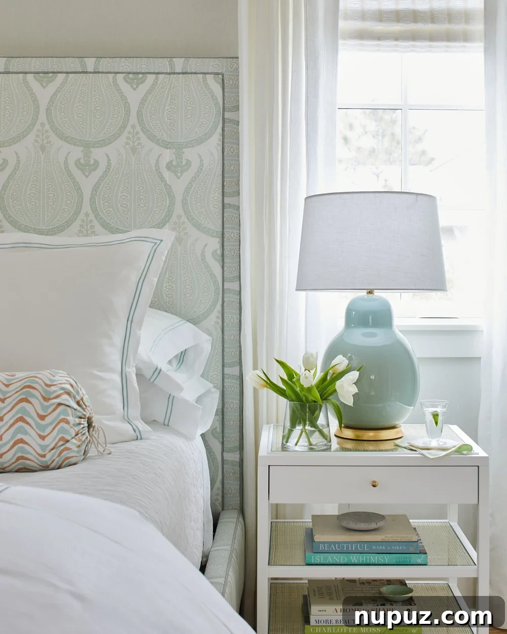 Breezy Blue and White Coastal Bliss 11 An inspiring detail from the Kara Miller beach house, illustrating the masterful use of texture and light within the serene blue and white interior.
