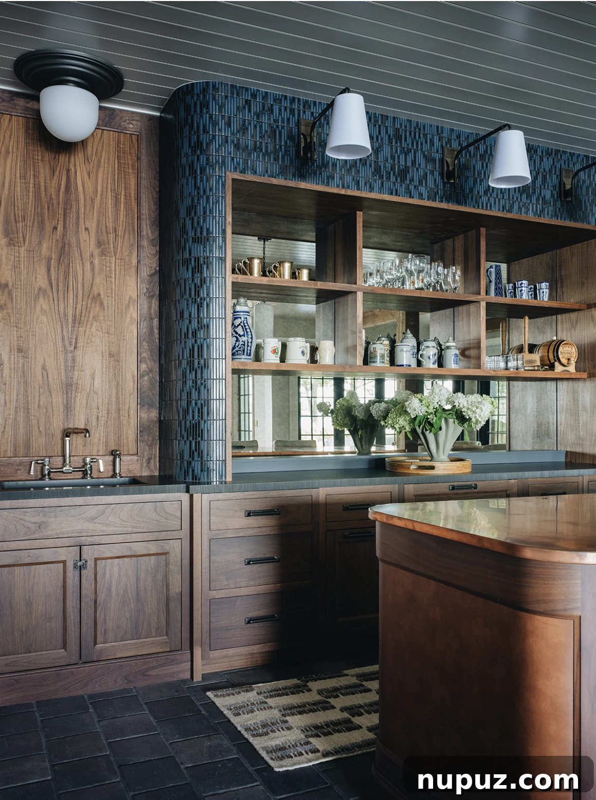 Sophisticated dark stained bar area by Stoffer Photography Interiors, demonstrating exquisite craftsmanship
