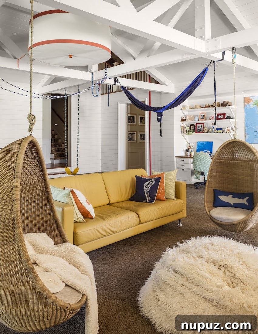 Collins Interiors | Nathan Schroder Photography - playroom with wicker hanging chairs