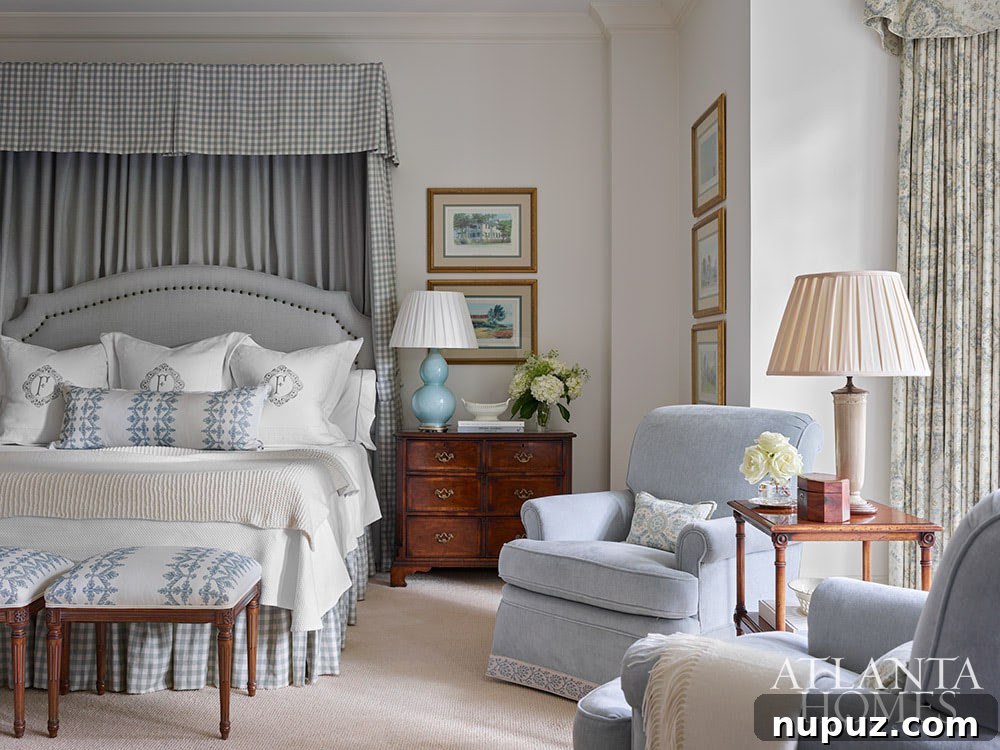This gorgeous Atlanta, Georgia condo fits a lot of style into a smaller space. It's a perfect example of classic city living with timeless interior design done right. Interior Design: Lauren Davenport, Davenport Designs,  Original Architect: Clay Ulmer, Renovation Builder: Matthew Morris, MT Morris Construction, | Photographer: Emily Followill Photography - canopy bed in blue and white