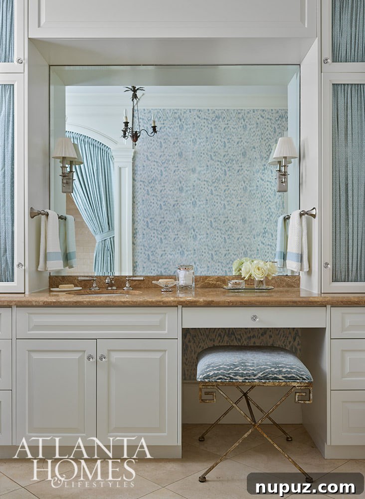 This gorgeous Atlanta, Georgia condo fits a lot of style into a smaller space. It's a perfect example of classic city living with timeless interior design done right. Interior Design: Lauren Davenport, Davenport Designs,  Original Architect: Clay Ulmer, Renovation Builder: Matthew Morris, MT Morris Construction, | Photographer: Emily Followill Photography - blue and white bathroom