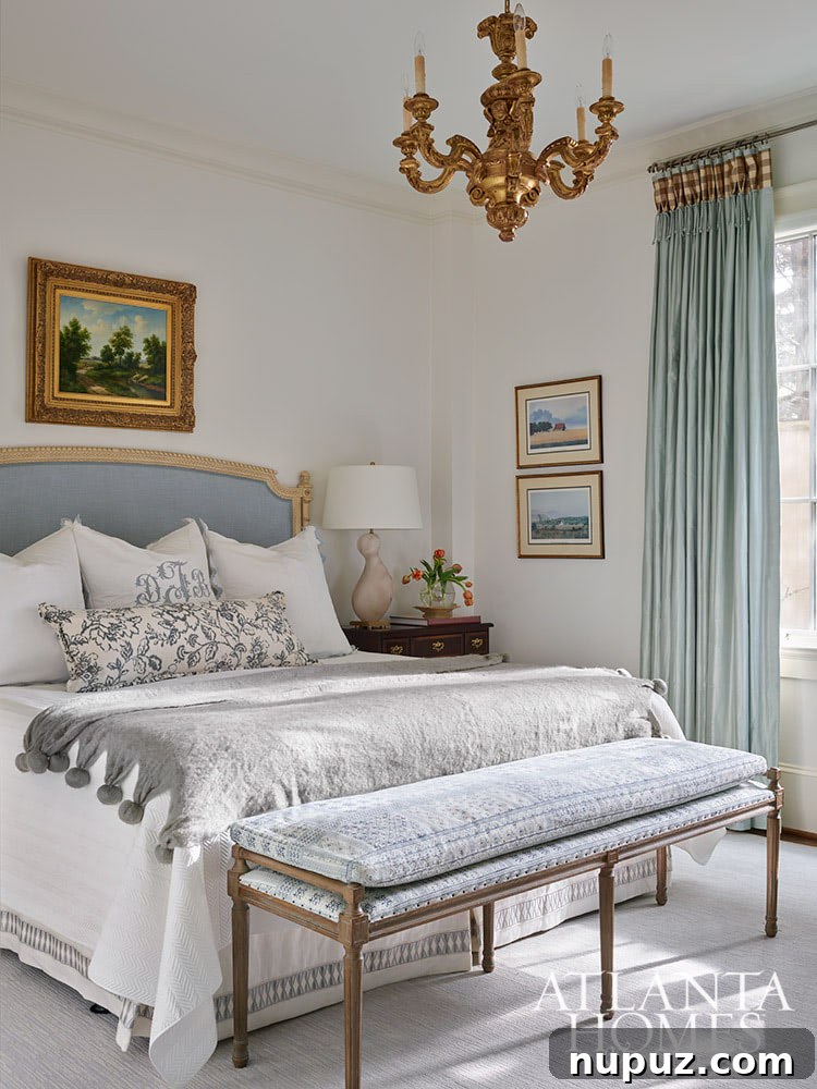 This gorgeous Atlanta, Georgia condo fits a lot of style into a smaller space. It's a perfect example of classic city living with timeless interior design done right. Interior Design: Lauren Davenport, Davenport Designs,  Original Architect: Clay Ulmer, Renovation Builder: Matthew Morris, MT Morris Construction, | Photographer: Emily Followill Photography blue and white bedroom