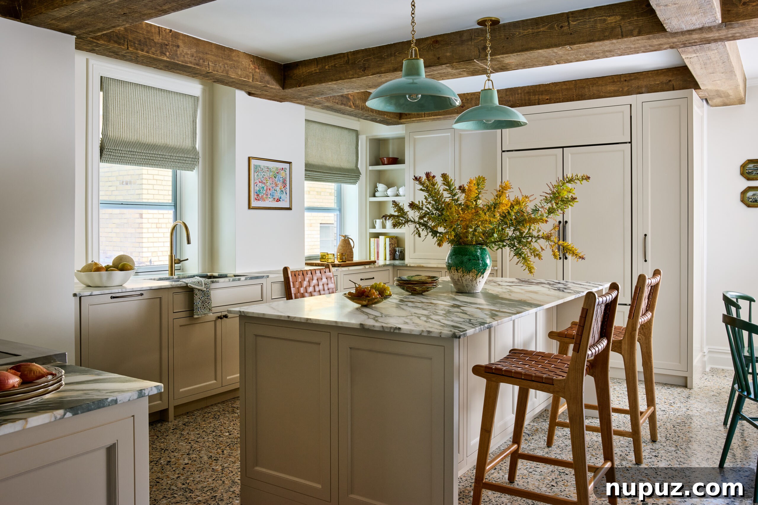 Kitchen with wood beams and blue pendant lights