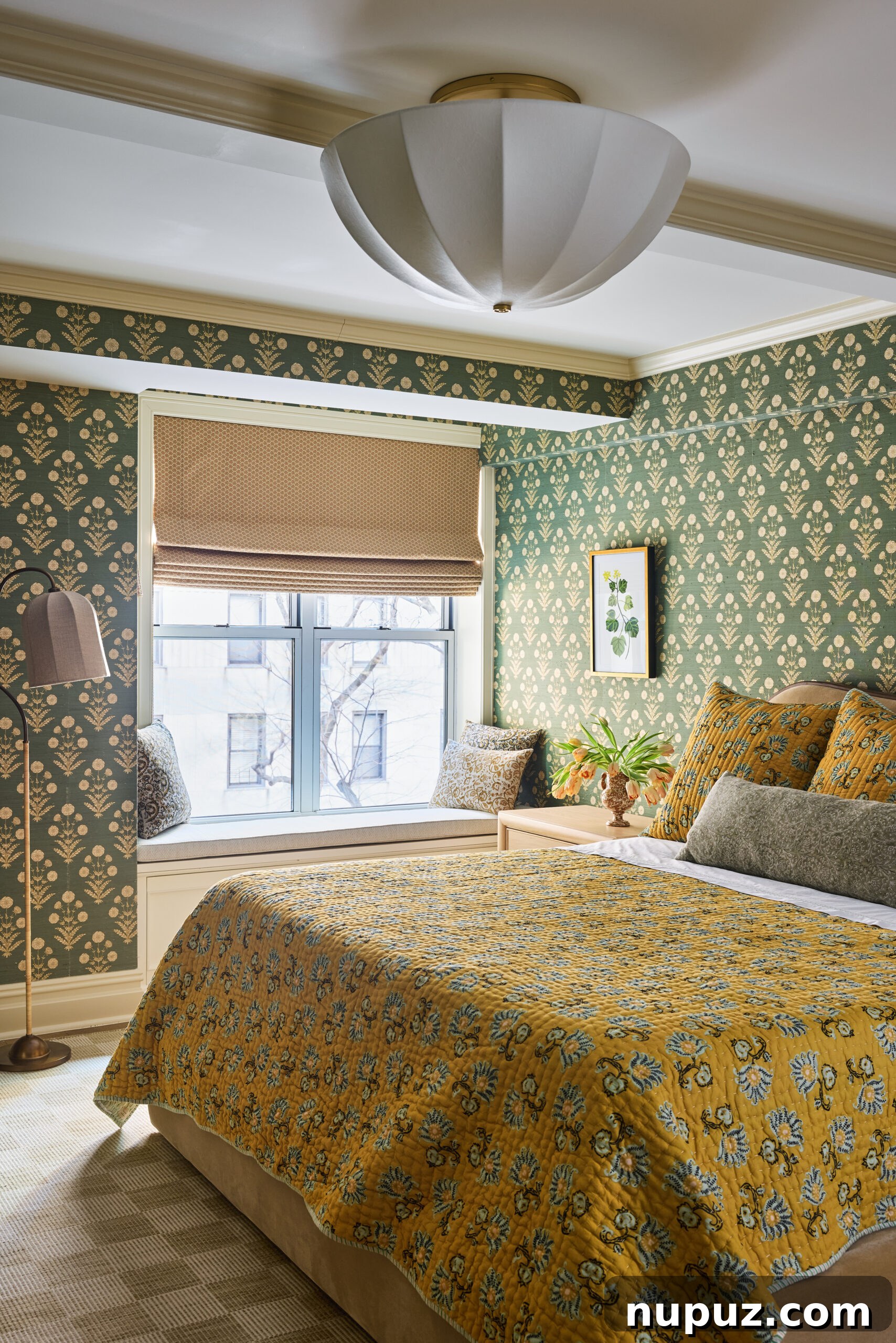 Bedroom with patterned wallpaper and chandelier