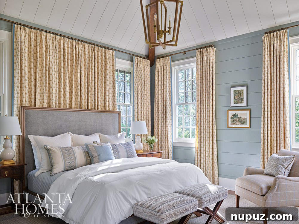 Bedroom with moody blue shiplap walls