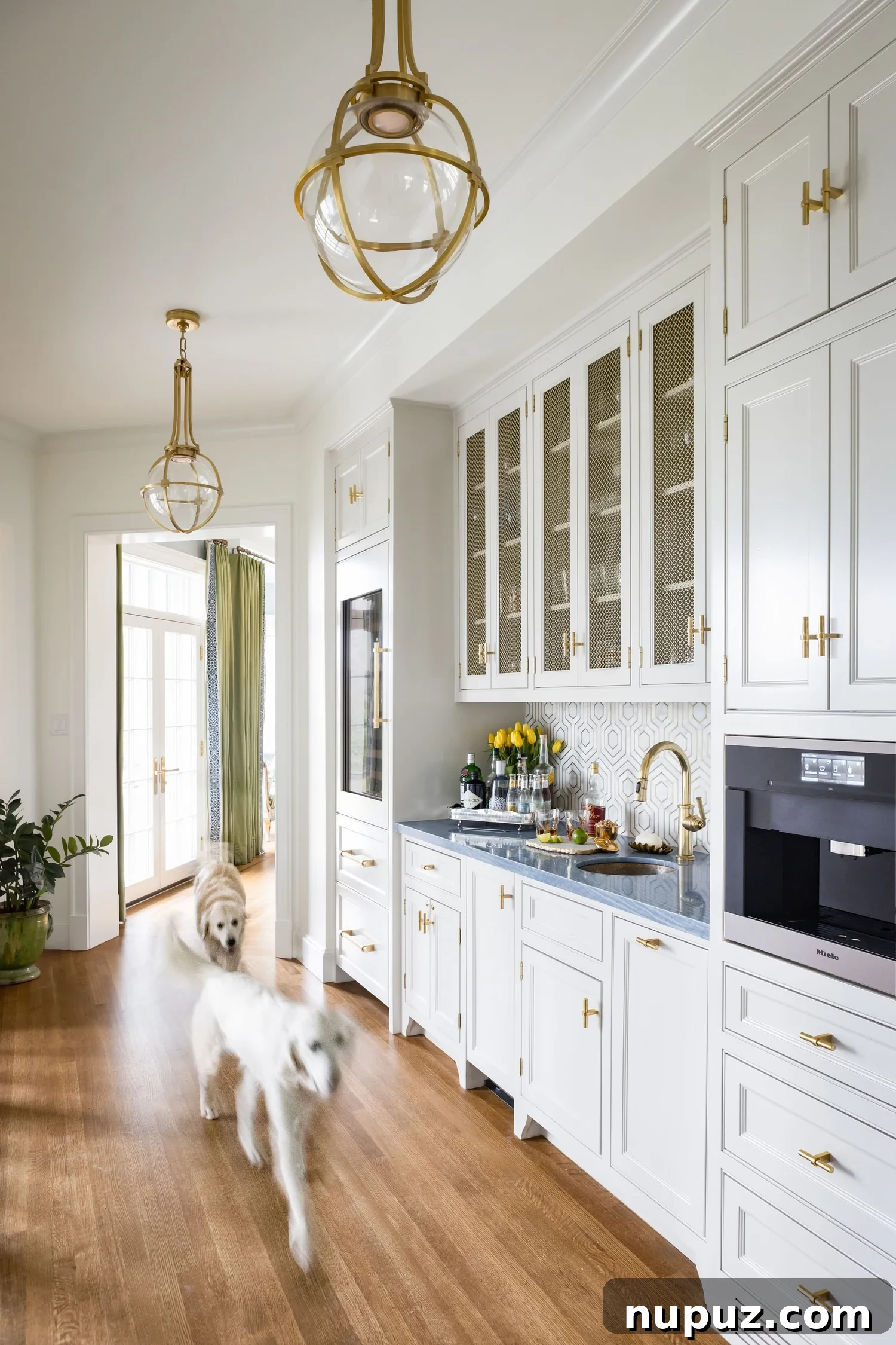 Love the wet bar in this home with a silver gallery tray that creates a bar for a timeless home design