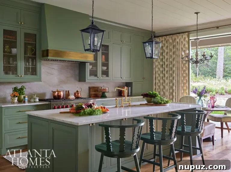 Green kitchen with hanging lanterns