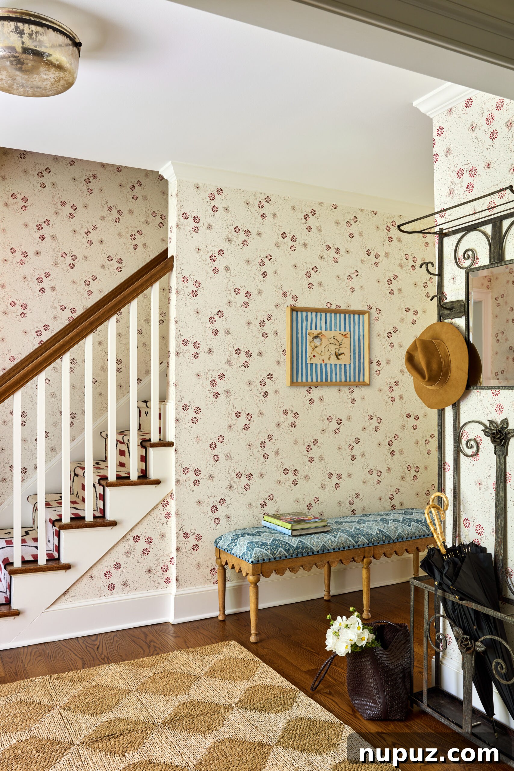 Jennifer Hunter creates perfect spaces in this timeless Bedford home and has us teeming with inspiration. Love the wallpaper in this foyer with a hall tree and charming bench