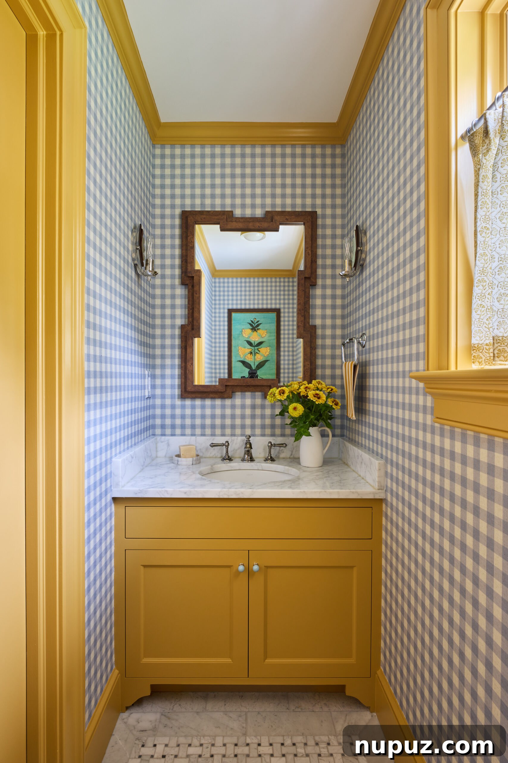 Jennifer Hunter creates perfect spaces in this timeless Bedford home. Adore the blue and white check wallpaper in this charming bathroom