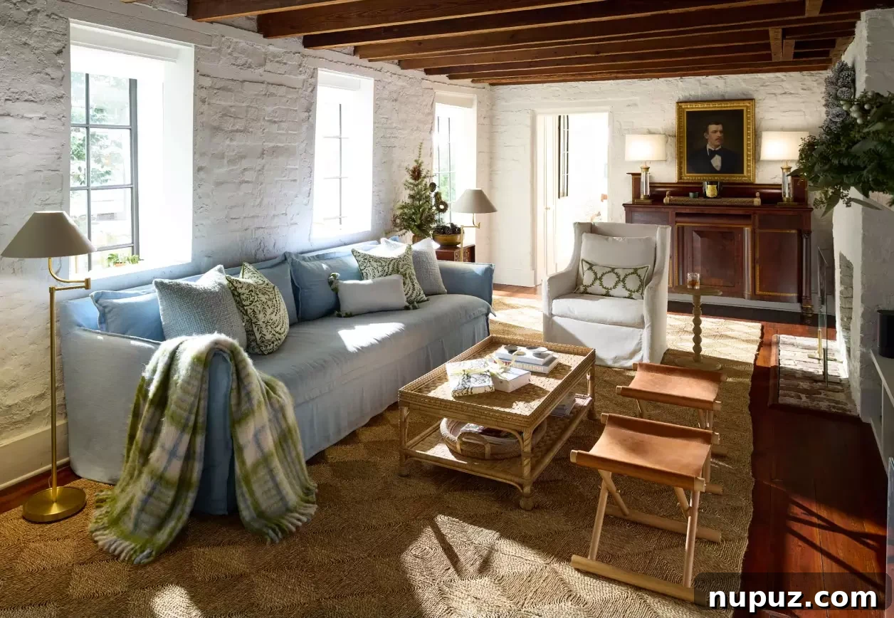 Beautiful home tours in every style - love the blue sofa in the cozy home with wood beams