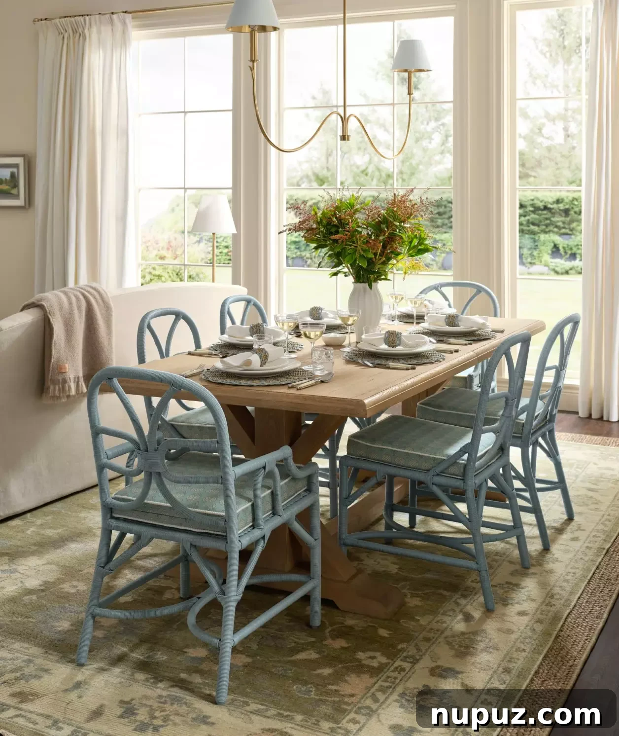 Love the blue wicker chair in this dining room