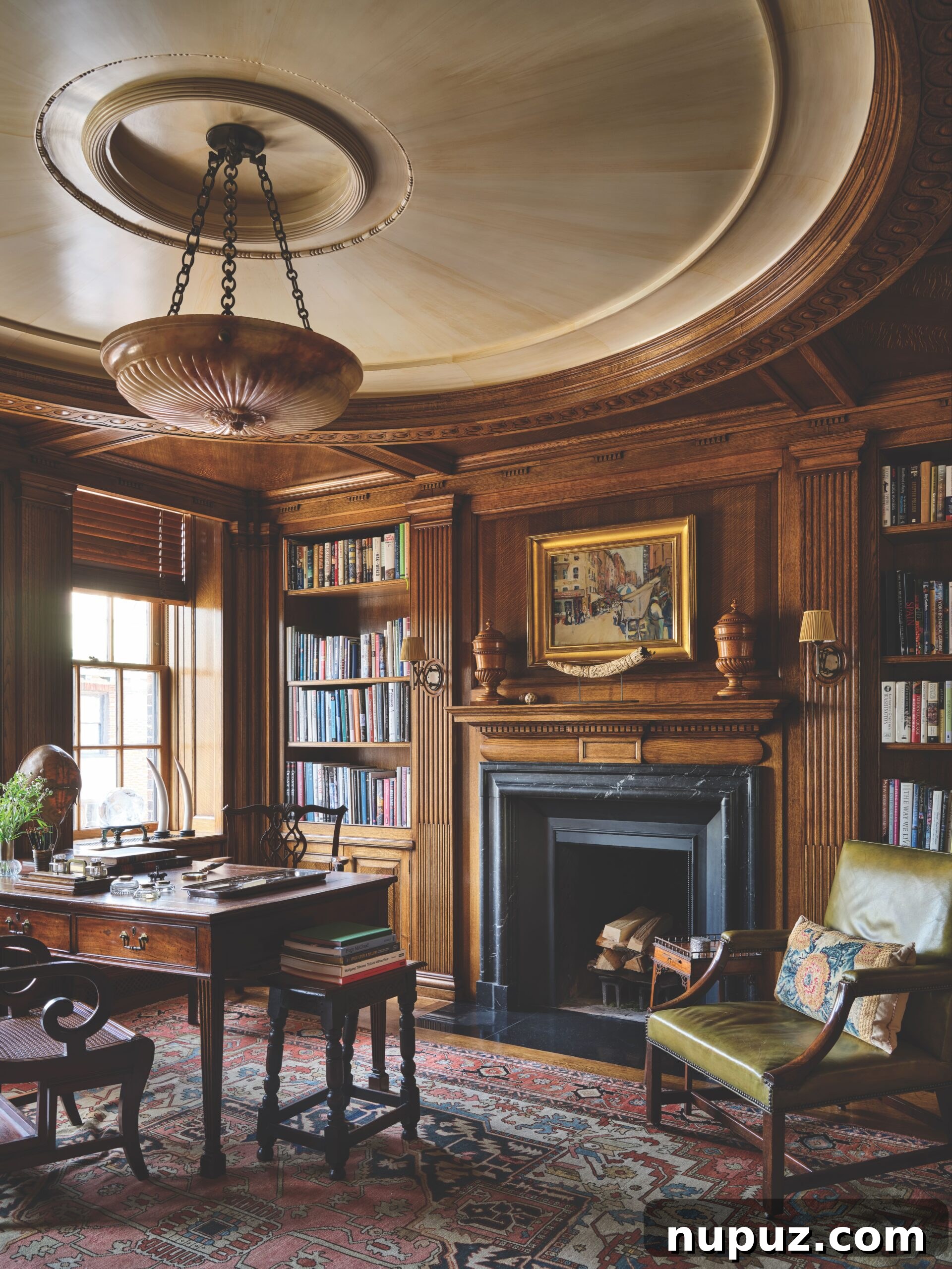 Beautiful home library with wood paneling and a desk