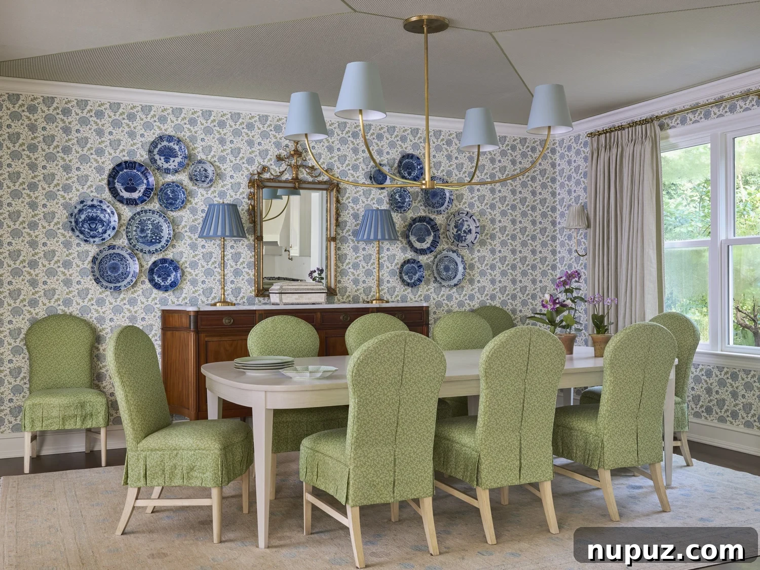 Dining room with green slipcovered chairs
