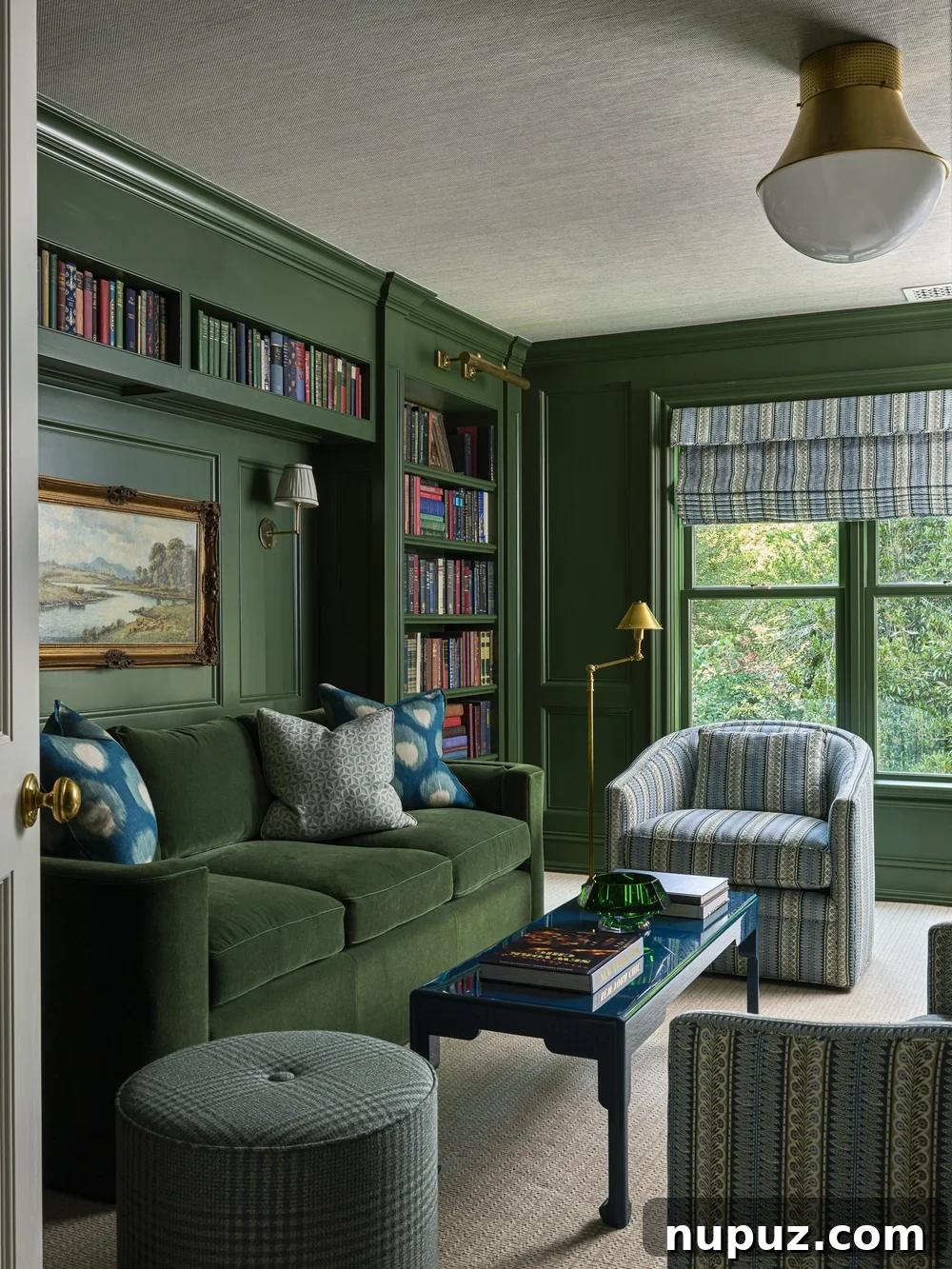 Living room with green velvet sofa