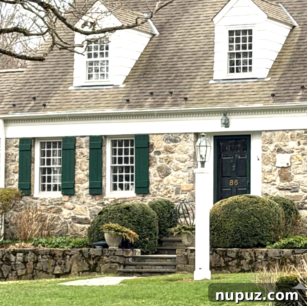 There is absolutely nothing like making an entrance, a grand first impression, in our lives and in our homes. This stone house, photographed by The Potted Boxwood is the best of the best when it comes to curb appeal.