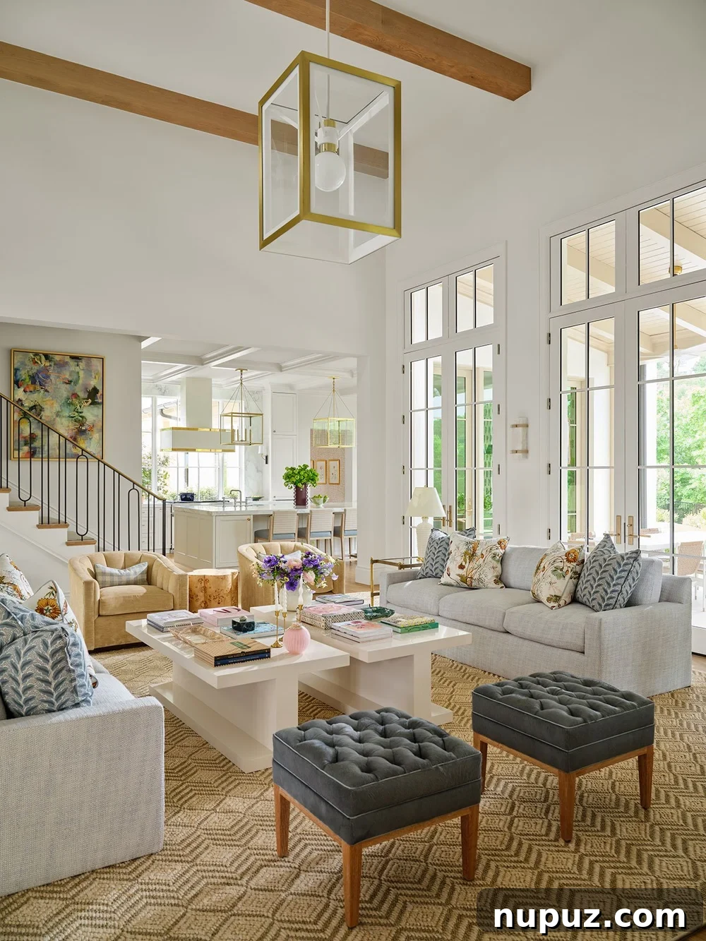 Living room with white sofas and exposed wood beams
