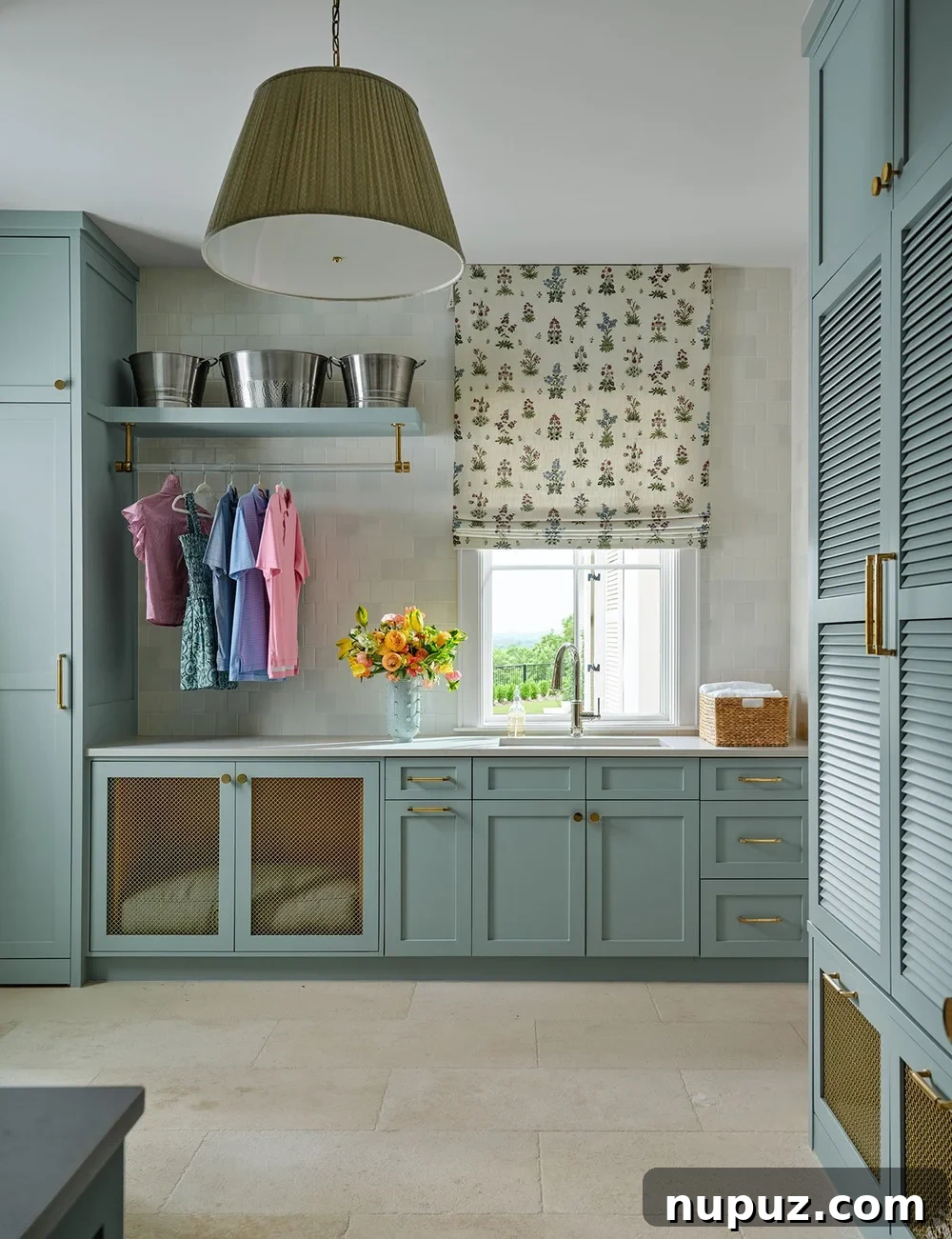 Blue laundry room with louvered doors