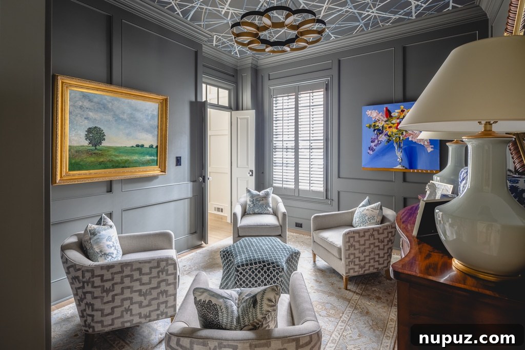 Family room in moody blue with color-drenched design