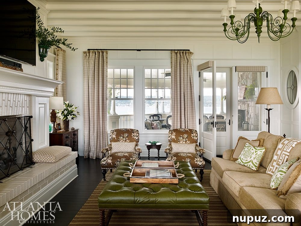 Tour a gorgeous waterfront home designed by Jackye Lanham that will leave you absolutely breathless. You don't want to miss a single detail! Emily Followill Photography - in Atlanta Homes & LIfestyles - Love the neutral decor in this beautiful living room