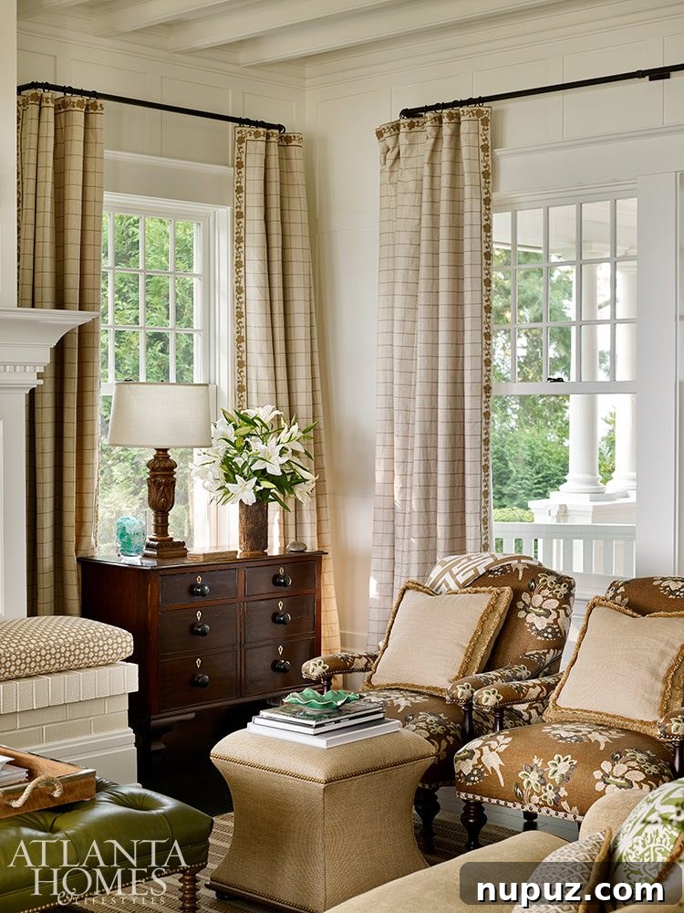 Tour a gorgeous waterfront home designed by Jackye Lanham that will leave you absolutely breathless. You don't want to miss a single detail! Emily Followill Photography - in Atlanta Homes & LIfestyles- love the neutral decor in this beautiful living room