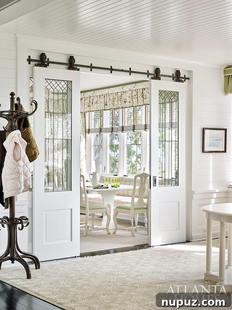 Tour a gorgeous waterfront home designed by Jackye Lanham that will leave you absolutely breathless. You don't want to miss a single detail! Emily Followill Photography - in Atlanta Homes & LIfestyles . Love the halltree in this historic home