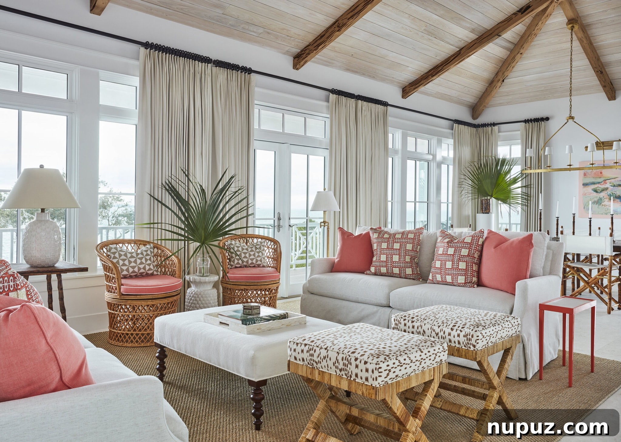 Refined yet laid-back, sophisticated yet welcoming, Kara Miller Interiors creates beautiful living rooms that feel like home. Brantley Photography - love th rush house rug and x wicker stools in the living room