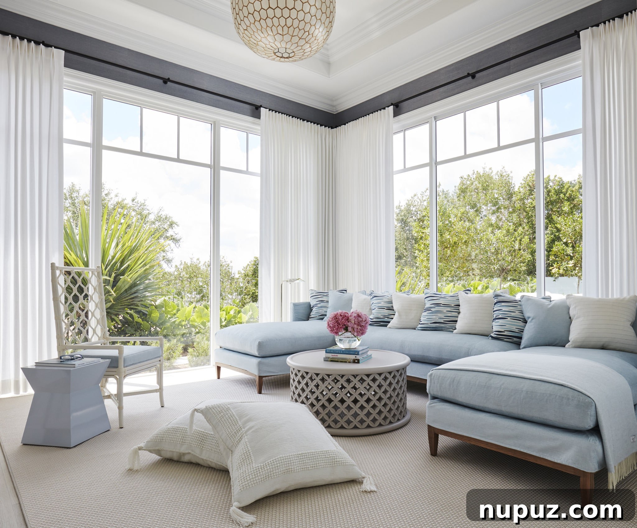 Refined yet laid-back, sophisticated yet welcoming, Kara Miller Interiors creates beautiful living rooms that feel like home. Brantley Photography - love the blue sectional sofa in the living room